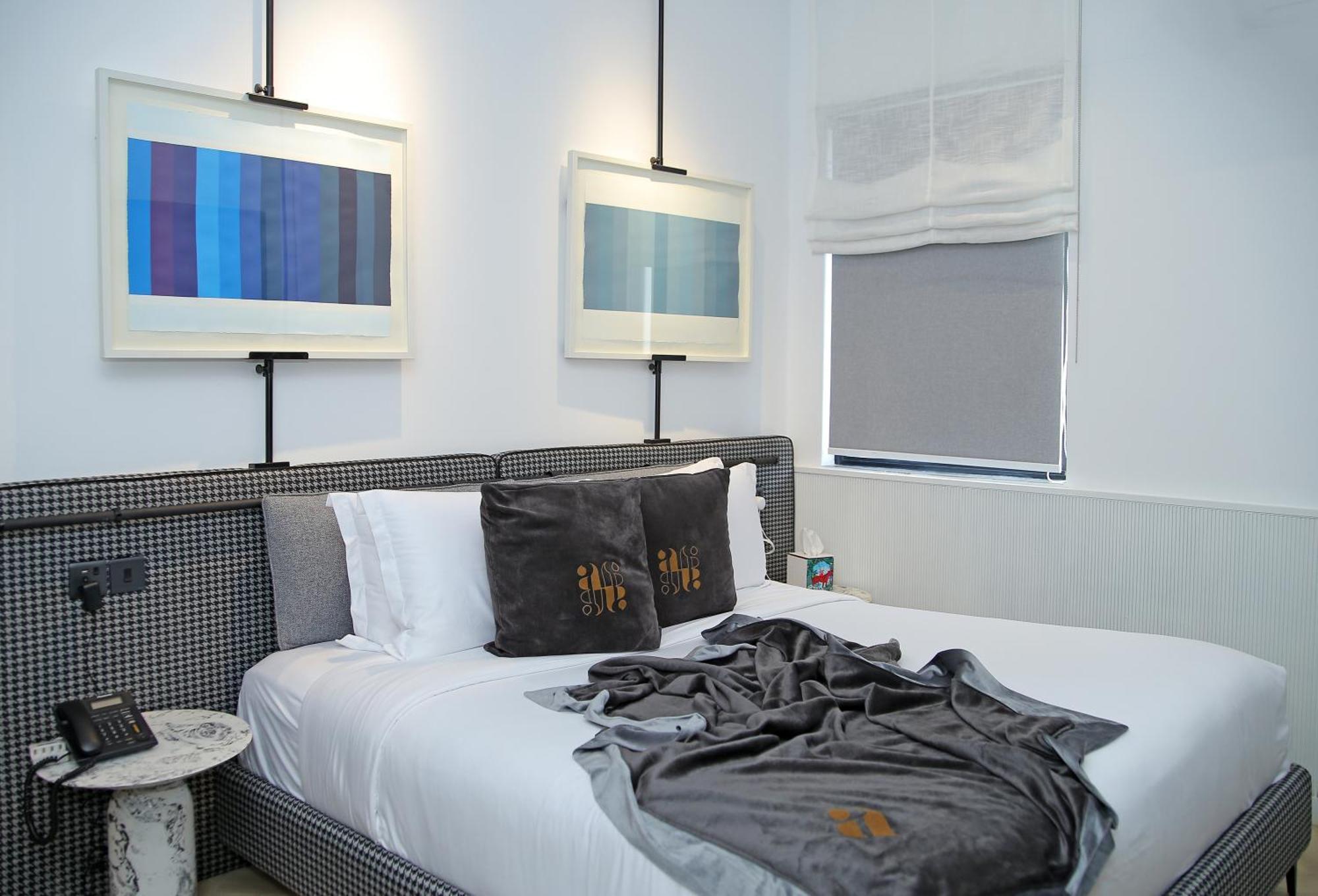 Ambiance Boutique Art Hotel 拉合尔 客房 照片 A bedroom at the Standard East Village
